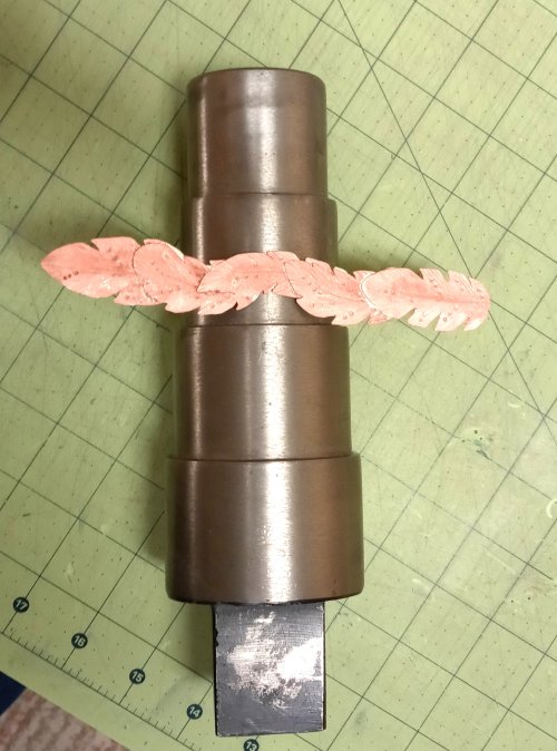 Judy Larson's Copper Feather Earrings Remodel Into Cuff - , Metalwork, Cutting, Cutting Tool, Cutters, Oxidizing Wire, Oxidizing, Antiquing Wire, Antiquing, Stamping, Stamps, Texturing, Butane Torch, Soldering, Solder, Design, sanding, filing, polishing, Center the cuff over the desired step
